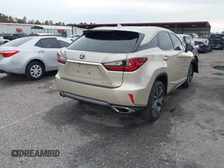 2018 Lexus RX with VIN 2T2ZZMCA9JC099803, listed as a IAAI auction lot 41052078 with 32,423 mi miles. Bid and sale history available at carsss.com. Image 4.