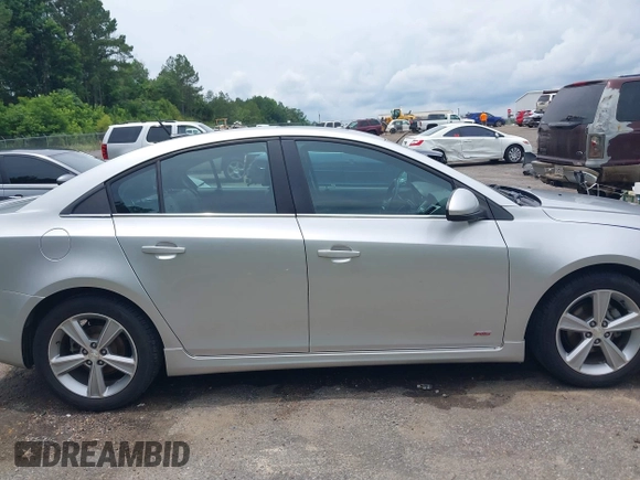 2014 Chevrolet Cruze 2LT z VIN 1G1PE5SB6E7270997, wystawiony jako IAAI lot #42323955 z przebiegiem 146 752 mil mil oraz . Historia ofert i sprzedaży dostępna na DreamBid. Obrazek 13.