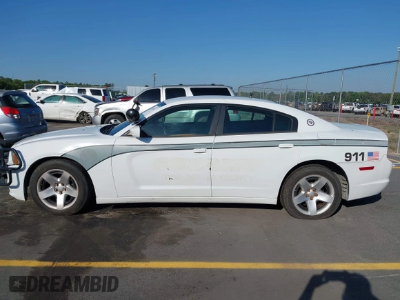 2014 Dodge Charger Police with VIN 2C3CDXAT8EH348719, listed as a IAAI auction lot 42026437 with 140,573 mi miles and . Bid and sale history available at DreamBid. Image 14.