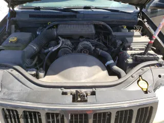 2005 Jeep Grand Cherokee Laredo with VIN 1J4GR48K95C628365, listed as a Copart auction lot 52524515 with 214,630 mi miles and Clean Title. Bid and sale history available at carsss.com. Image 12.