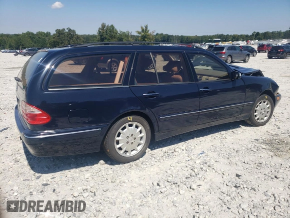 2001 Mercedes-Benz E-Class AWD with VIN WDBJH82J91X057063, listed as a Copart auction lot 70235274 with 174,846 mi miles and Salvage Title. Bid and sale history available at carsss.com. Image 3.