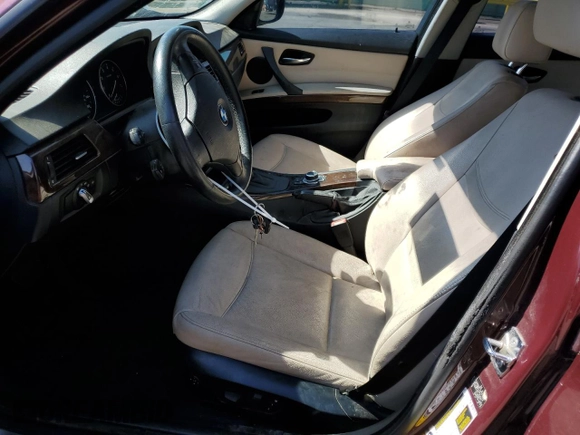 2009 BMW 3 Series 328i xDrive with VIN WBAPK73589A451495, listed as a Copart auction lot 61677195 with 113,144 mi miles and Salvage title. Bid and sale history available at DreamBid. Image 7.