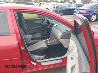 2009 Toyota Corolla with VIN JTDBL40E999058670, listed as a IAAI auction lot 42191508 with 129,398 mi miles and . Bid and sale history available at DreamBid. Image 5.
