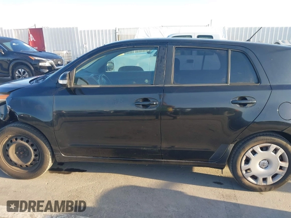 2011 Scion xD with VIN JTKKU4B46B1009909, listed as a IAAI auction lot 41959824 with 185,764 mi miles. Bid and sale history available at carsss.com. Image 14.