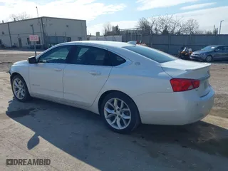 2015 Chevrolet Impala LT with VIN 1G1125S35FU138193, listed as a IAAI auction lot 41883603 with 105,763 mi miles. Bid and sale history available at carsss.com. Image 3.