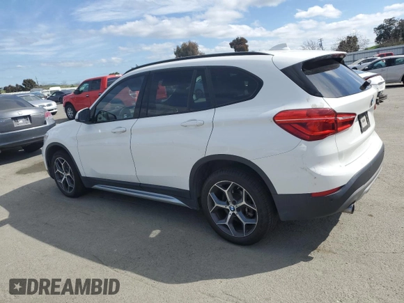 2017 BMW X1 sDrive28i with VIN WBXHU7C39H5H37756, listed as a Copart auction lot 50769975 with 82,479 mi miles and Salvage Title. Bid and sale history available at carsss.com. Image 2.