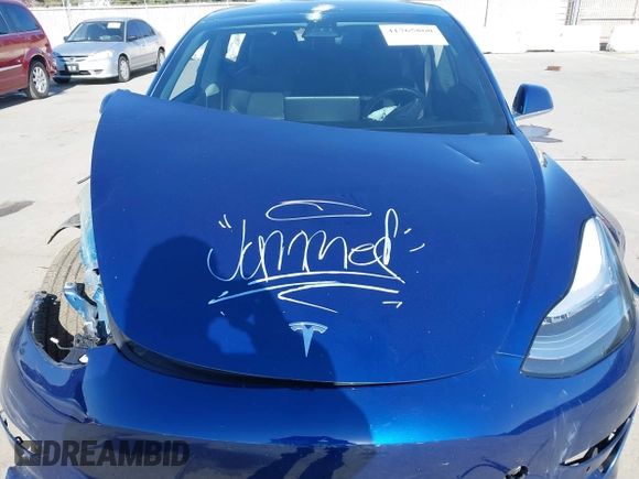 2018 Tesla Model 3 Long Range Battery with VIN 5YJ3E1EA4JF011799, listed as a IAAI auction lot 41765860 with 133,098 mi miles. Bid and sale history available at carsss.com. Image 10.