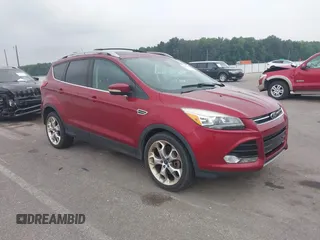 2013 Ford Escape Titanium z VIN 1FMCU0J90DUD07483, wystawiony jako IAAI lot #42629324 z przebiegiem 173 394 mil mil oraz . Historia ofert i sprzedaży dostępna na DreamBid. Obrazek 1.