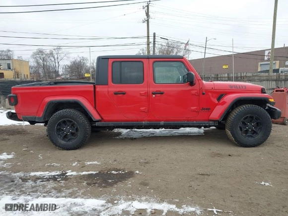 2021 Jeep Gladiator Willys with VIN 1C6HJTAG6ML550649, listed as a IAAI auction lot 41530585 with 119,002 mi miles. Bid and sale history available at carsss.com. Image 13.