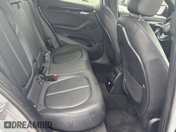 2018 BMW X1 sDrive28i with VIN WBXHU7C38J5L08773, listed as a Copart auction lot 55470955 with 149,885 mi miles and Clean Title. Bid and sale history available at DreamBid. Image 6.