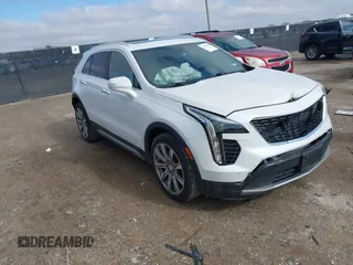 2019 Cadillac XT4 FWD Premium Luxury with VIN 1GYFZCR45KF133712, listed as a IAAI auction lot 41464942 with 63,710 mi miles. Bid and sale history available at carsss.com. Image 1.