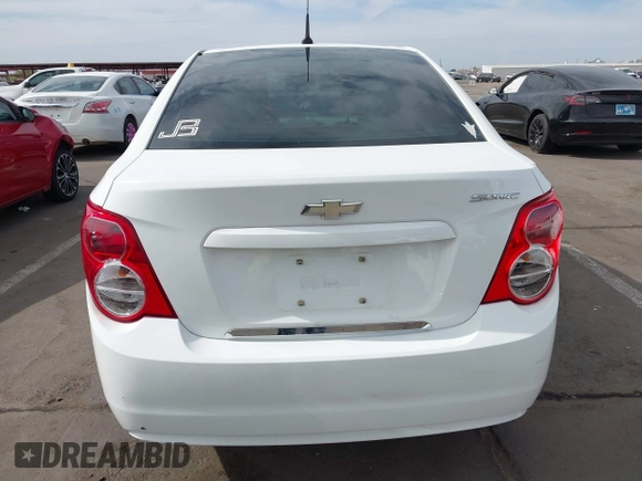 2013 Chevrolet Sonic LS with VIN 1G1JA5SH9D4249356, listed as a IAAI auction lot 42373352 with 151,337 mi miles and . Bid and sale history available at DreamBid. Image 17.