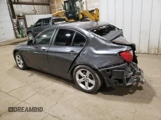 2015 BMW 3 Series 328i xDrive with VIN WBA3B5C58FF962674, listed as a Copart auction lot 58994595 with Not provided miles and Salvage title. Bid and sale history available at DreamBid. Image 2.