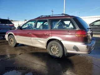 1999 Subaru Legacy Outback with VIN 4S3BG6851X7637598, listed as a Copart auction lot 83469134 with 207,692 mi miles and Salvage title. Bid and sale history available at DreamBid. Image 2.