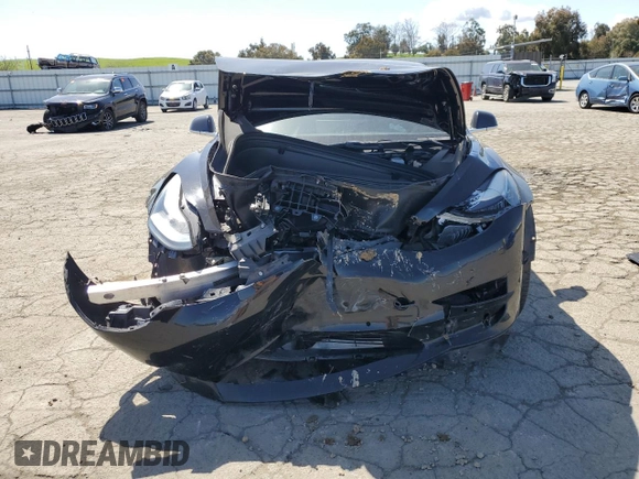 2019 Tesla Model 3 Mid Range z VIN 5YJ3E1EA8KF424584, wystawiony jako Copart lot #51331635 z przebiegiem 87 355 mil mil oraz Szkody całkowita. Historia ofert i sprzedaży dostępna na DreamBid. Obrazek 5.