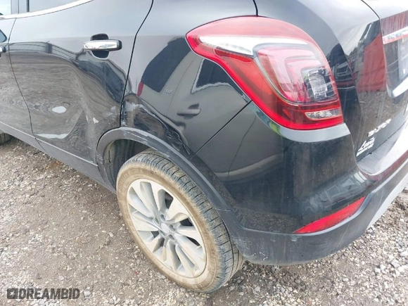 2018 Buick Encore Preferred with VIN KL4CJASB1JB549771, listed as a IAAI auction lot 40669021 with 83,570 mi miles. Bid and sale history available at carsss.com. Image 6.