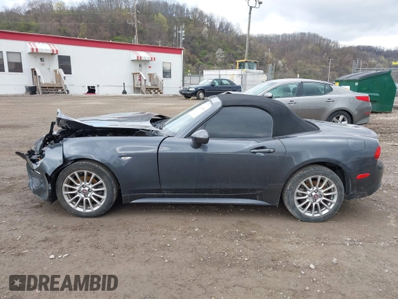 2017 FIAT 124 Spider Lusso z VIN JC1NFAEK7H0106877, wystawiony jako IAAI lot #42049505 z przebiegiem 54 487 mil mil oraz . Historia ofert i sprzedaży dostępna na DreamBid. Obrazek 15.