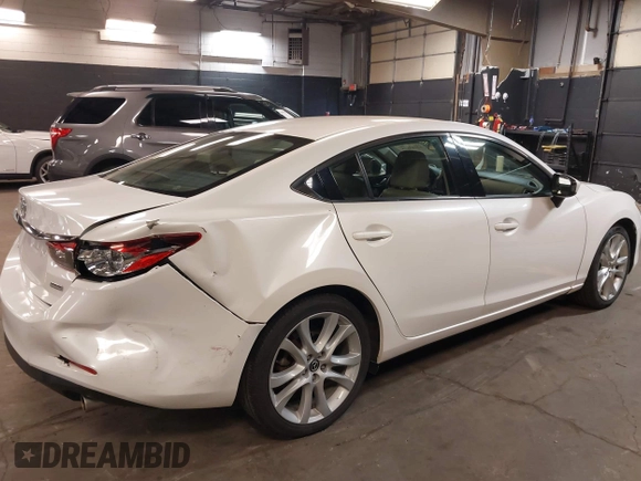 2014 Mazda Mazda6 i Touring with VIN JM1GJ1V68E1147067, listed as a IAAI auction lot 42105878 with 102,684 mi miles. Bid and sale history available at carsss.com. Image 6.