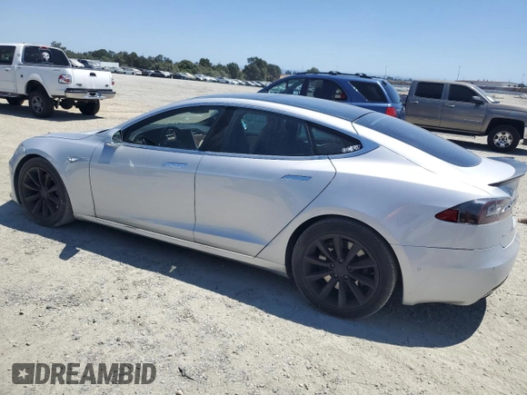 2016 Tesla Model S 90D с VIN 5YJSA1E23GF144496, выставлен на аукционе Copart как лот 64080845 с пробегом 34 847 миль миль и Списание • Salvage title. История ставок и продаж доступна на DreamBid. Изображение 2.