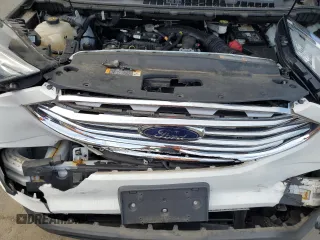 2019 Ford Edge SE z VIN 2FMPK4G94KBB24225, wystawiony jako Copart lot #61424715 z przebiegiem 73 324 mil mil oraz Szkoda całkowita • Salvage title. Historia ofert i sprzedaży dostępna na DreamBid. Obrazek 11.