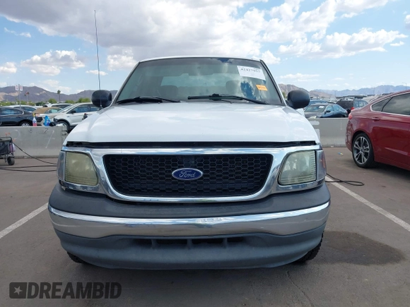 2003 Ford F-150 XL with VIN 1FTRX17L43NB82477, listed as a IAAI auction lot 42427957 with Not provided miles and . Bid and sale history available at DreamBid. Image 12.