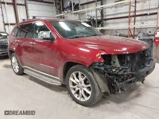 2014 Jeep Grand Cherokee Summit with VIN 1C4RJFJT4EC308729, listed as a IAAI auction lot 41694212 with 175,654 mi miles. Bid and sale history available at carsss.com. Image 1.