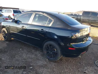 2009 Mazda 3 i Touring Value with VIN JM1BK32F591192030, listed as a IAAI auction lot 41248304 with 153,467 mi miles. Bid and sale history available at carsss.com. Image 3.