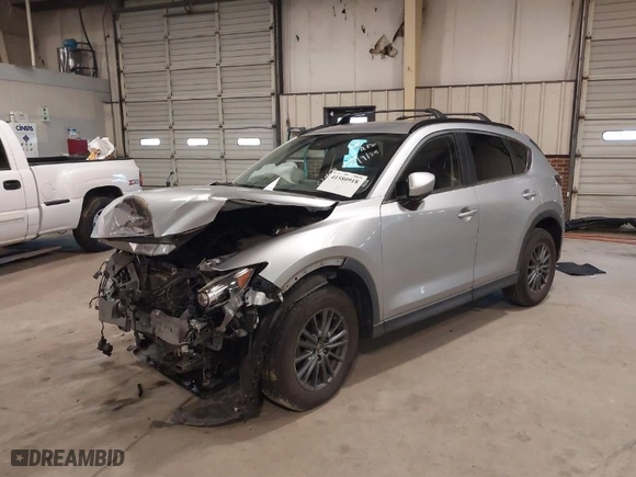 2019 Mazda CX-5 Touring with VIN JM3KFACM7K1551252, listed as a IAAI auction lot 41580918 with NaN miles. Bid and sale history available at carsss.com. Image 2.
