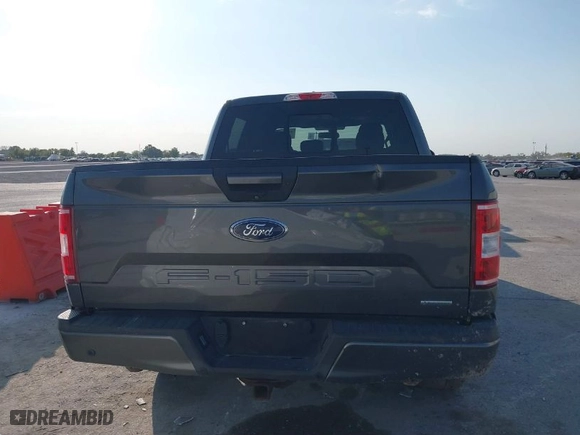 2018 Ford F-150 XL with VIN 1FTEW1EG3JKF69057, listed as a IAAI auction lot 40575356 with 106,384 mi miles. Bid and sale history available at carsss.com. Image 16.