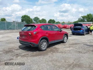 2015 Mazda CX-5 Sport with VIN JM3KE4BY5F0502121, listed as a IAAI auction lot 42652276 with 192,462 mi miles and . Bid and sale history available at DreamBid. Image 4.