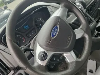 2016 Ford Transit Cargo z VIN 1FTYE1YM1GKB15643, wystawiony jako IAAI lot #42585640 z przebiegiem 301 257 mil mil oraz . Historia ofert i sprzedaży dostępna na DreamBid. Obrazek 23.
