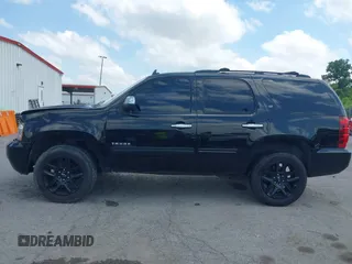 2013 Chevrolet Tahoe LT with VIN 1GNSCBE00DR337071, listed as a IAAI auction lot 42282457 with 151,460 mi miles and . Bid and sale history available at DreamBid. Image 14.