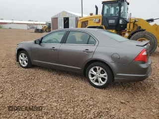 2012 Ford Fusion SE with VIN 3FAHP0HA7CR317179, listed as a Copart auction lot 60606575 with 148,766 mi miles and Clean title. Bid and sale history available at DreamBid. Image 2.
