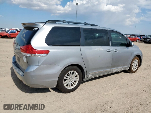 2012 Toyota Sienna XLE AAS with VIN 5TDYK3DC5CS262097, listed as a Copart auction lot 60682995 with 227,361 mi miles and Clean title. Bid and sale history available at DreamBid. Image 3.