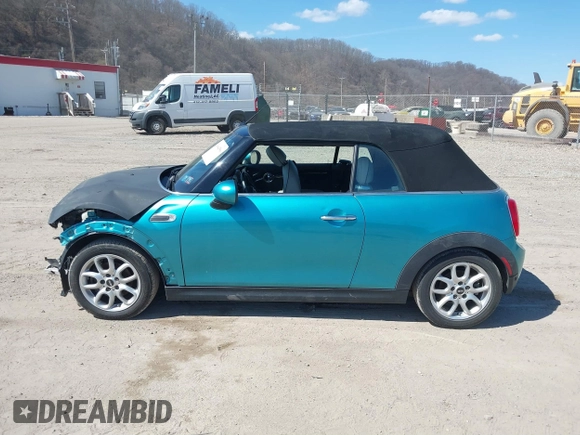 2016 MINI Convertible z VIN WMWWG5C53G3C18842, wystawiony jako IAAI lot #41864596 z przebiegiem 91 253 mil mil oraz . Historia ofert i sprzedaży dostępna na DreamBid. Obrazek 14.