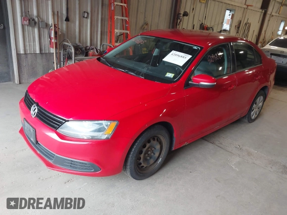 2014 Volkswagen Jetta SE z VIN 3VWD17AJ5EM249216, wystawiony jako IAAI lot #42096885 z przebiegiem 188 166 mil mil oraz . Historia ofert i sprzedaży dostępna na DreamBid. Obrazek 2.