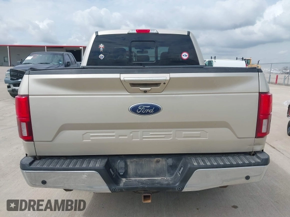 2018 Ford F-150 XL with VIN 1FTEW1E57JKC06727, listed as a IAAI auction lot 41683692 with 125,556 mi miles and . Bid and sale history available at DreamBid. Image 16.