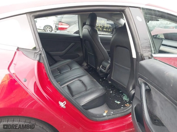 2018 Tesla Model 3 Long Range Battery with VIN 5YJ3E1EA4JF159743, listed as a IAAI auction lot 40839991 with 117,039 mi miles. Bid and sale history available at carsss.com. Image 8.
