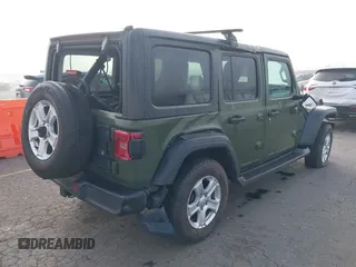 2021 Jeep Wrangler Unlimited Willys with VIN 1C4HJXDM1MW812674, listed as a IAAI auction lot 41670637 with 59,241 mi miles and . Bid and sale history available at DreamBid. Image 4.