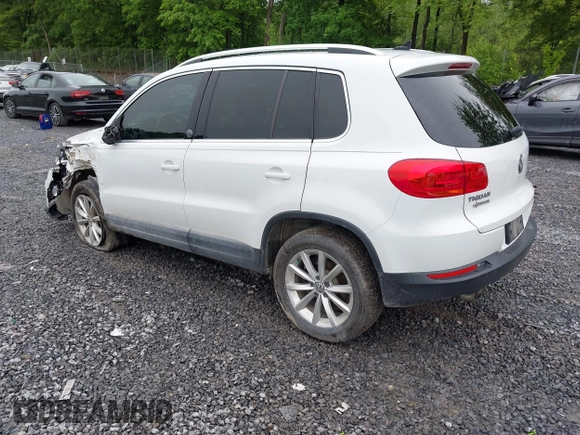 2017 Volkswagen Tiguan Wolfsburg Edition with VIN WVGRV7AX9HK002659, listed as a IAAI auction lot 42482438 with 88,841 mi miles and . Bid and sale history available at DreamBid. Image 3.