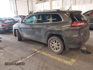 2014 Jeep Cherokee Latitude with VIN 1C4PJMCS4EW272815, listed as a IAAI auction lot 41616504 with 97,613 mi miles and . Bid and sale history available at carsss.com. Image 3.