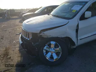 2011 Jeep Grand Cherokee Laredo with VIN 1J4RS4GGXBC739433, listed as a IAAI auction lot 41794031 with 174,672 mi miles and . Bid and sale history available at DreamBid. Image 6.