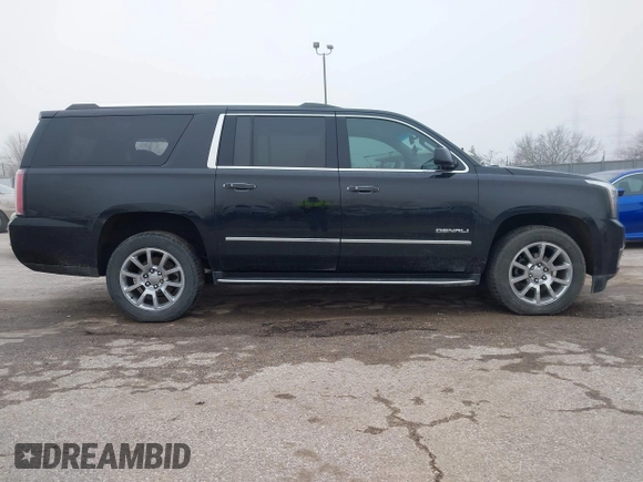 2017 GMC Yukon XL Denali with VIN 1GKS2HKJ2HR310377, listed as a IAAI auction lot 41153582 with 130,194 mi miles. Bid and sale history available at carsss.com. Image 14.