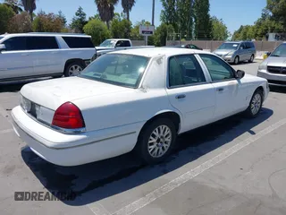 2004 Ford Crown Victoria LX z VIN 2FAFP74W34X170637, wystawiony jako IAAI lot #42478531 z przebiegiem 168 885 mil mil oraz . Historia ofert i sprzedaży dostępna na DreamBid. Obrazek 4.