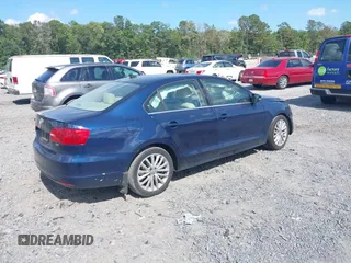 2014 Volkswagen Jetta TDI w/Premium/Nav with VIN 3VWLL7AJ3EM381929, listed as a IAAI auction lot 42539178 with 101,851 mi miles and . Bid and sale history available at DreamBid. Image 4.