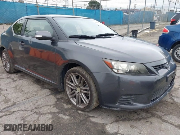 2013 Scion tC with VIN JTKJF5C76D3063500, listed as a IAAI auction lot 41916403 with 146,818 mi miles. Bid and sale history available at carsss.com. Image 1.