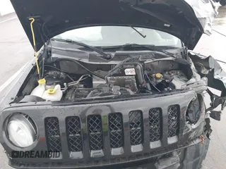 2014 Jeep Patriot Sport with VIN 1C4NJRBBXED879285, listed as a IAAI auction lot 41944152 with 103,676 mi miles. Bid and sale history available at carsss.com. Image 10.