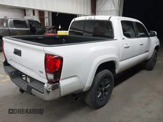 2023 Toyota Tacoma SR5 z VIN 3TYAZ5CN9PT030723, wystawiony jako IAAI lot #41607535 z przebiegiem 40 215 mil mil oraz . Historia ofert i sprzedaży dostępna na DreamBid. Obrazek 4.
