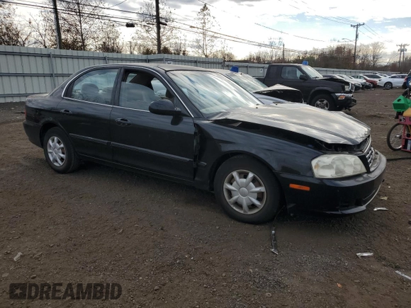 2001 Kia Optima LX z VIN KNAGD126315028712, wystawiony jako Copart lot #85302564 z przebiegiem 81 722 mil mil oraz Nie do naprawy • Non repairable. Historia ofert i sprzedaży dostępna na DreamBid. Obrazek 4.