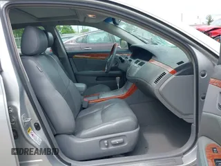2007 Toyota Avalon XL z VIN 4T1BK36B77U198619, wystawiony jako IAAI lot #42204373 z przebiegiem 348 721 mil mil oraz . Historia ofert i sprzedaży dostępna na DreamBid. Obrazek 5.